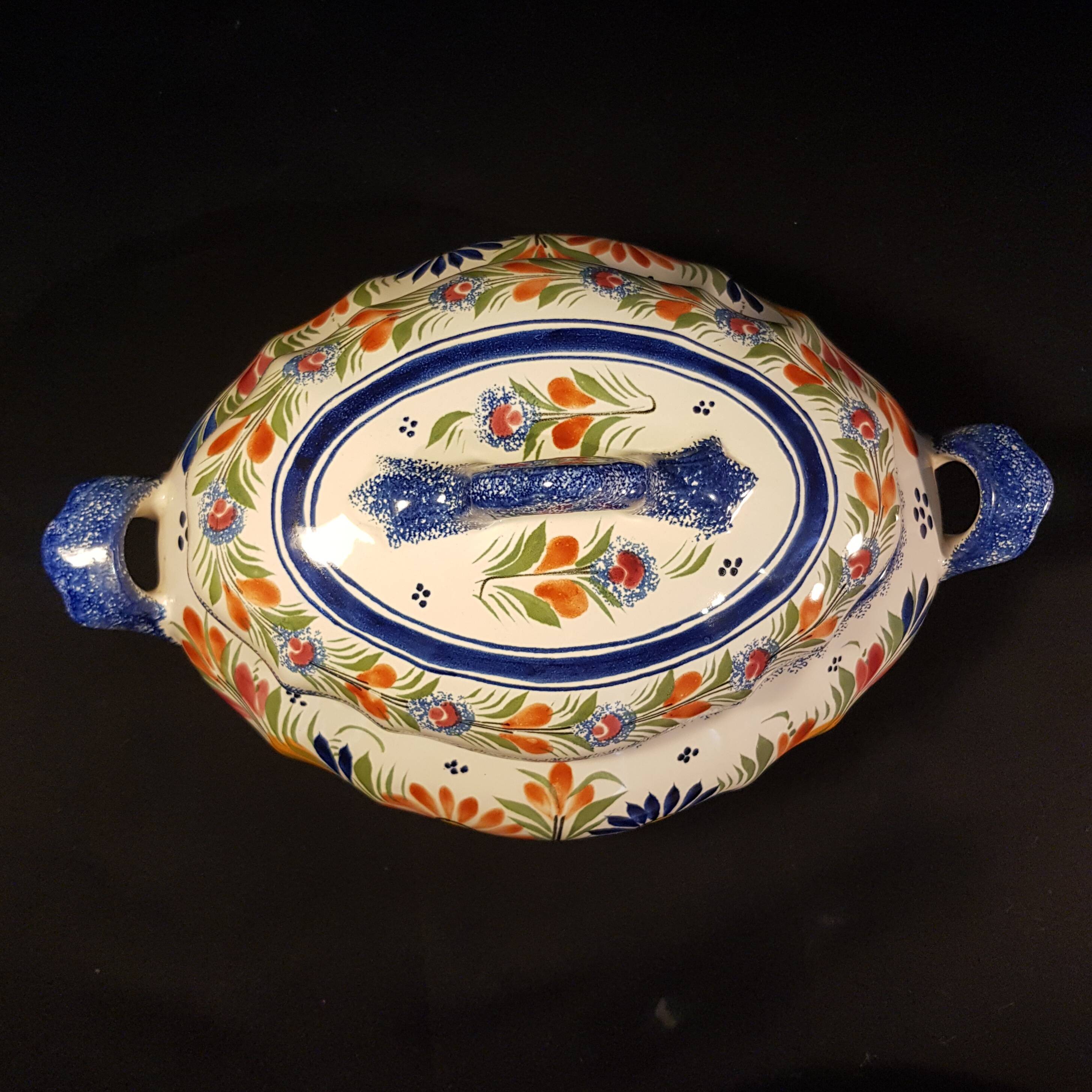 Vegetable soup tureen on Henriot Quimper display dish
