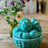 Vintage green earthenware plate/basket with fruit decorations.