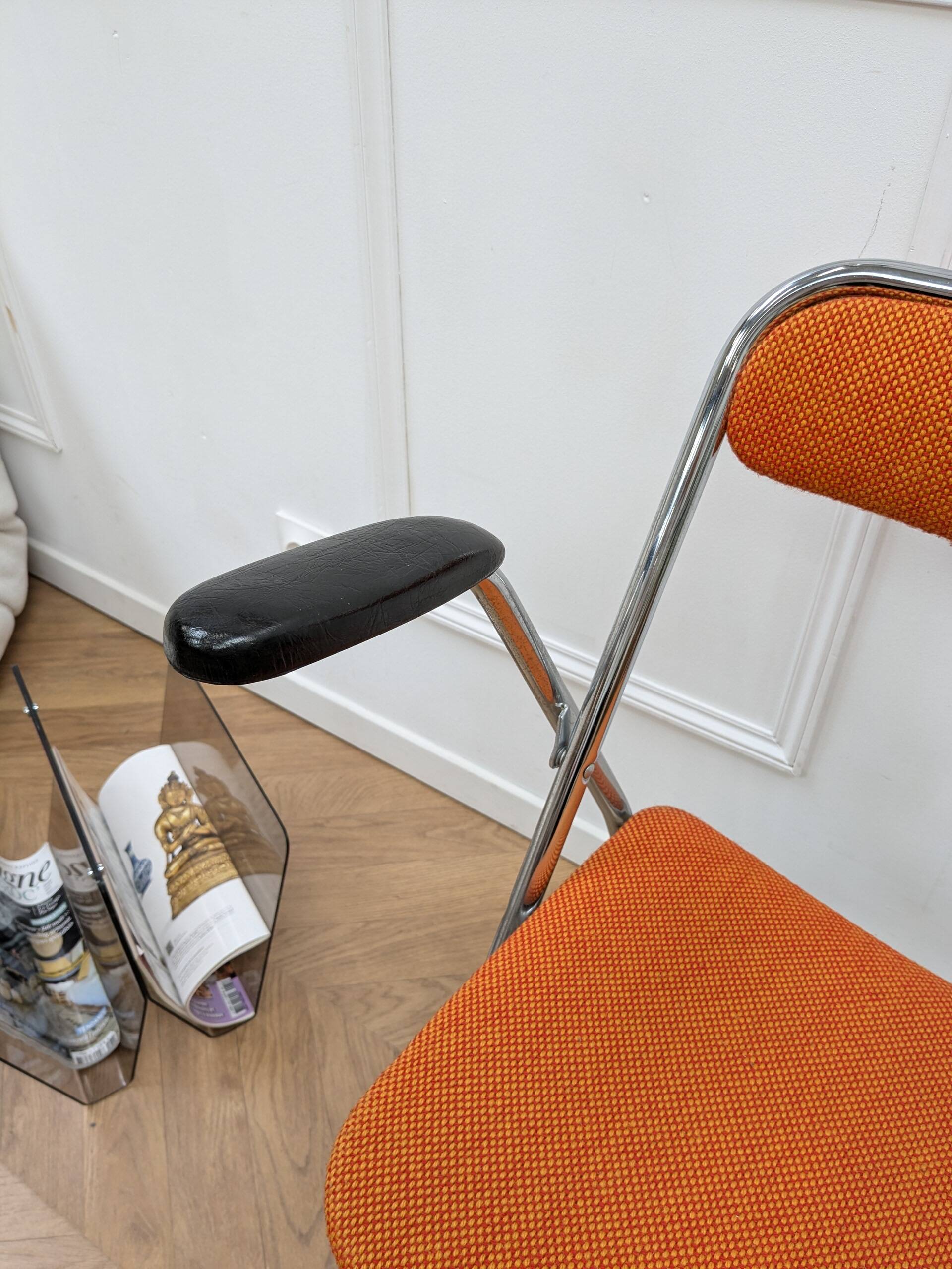 Orange folding chair