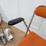 Orange folding chair