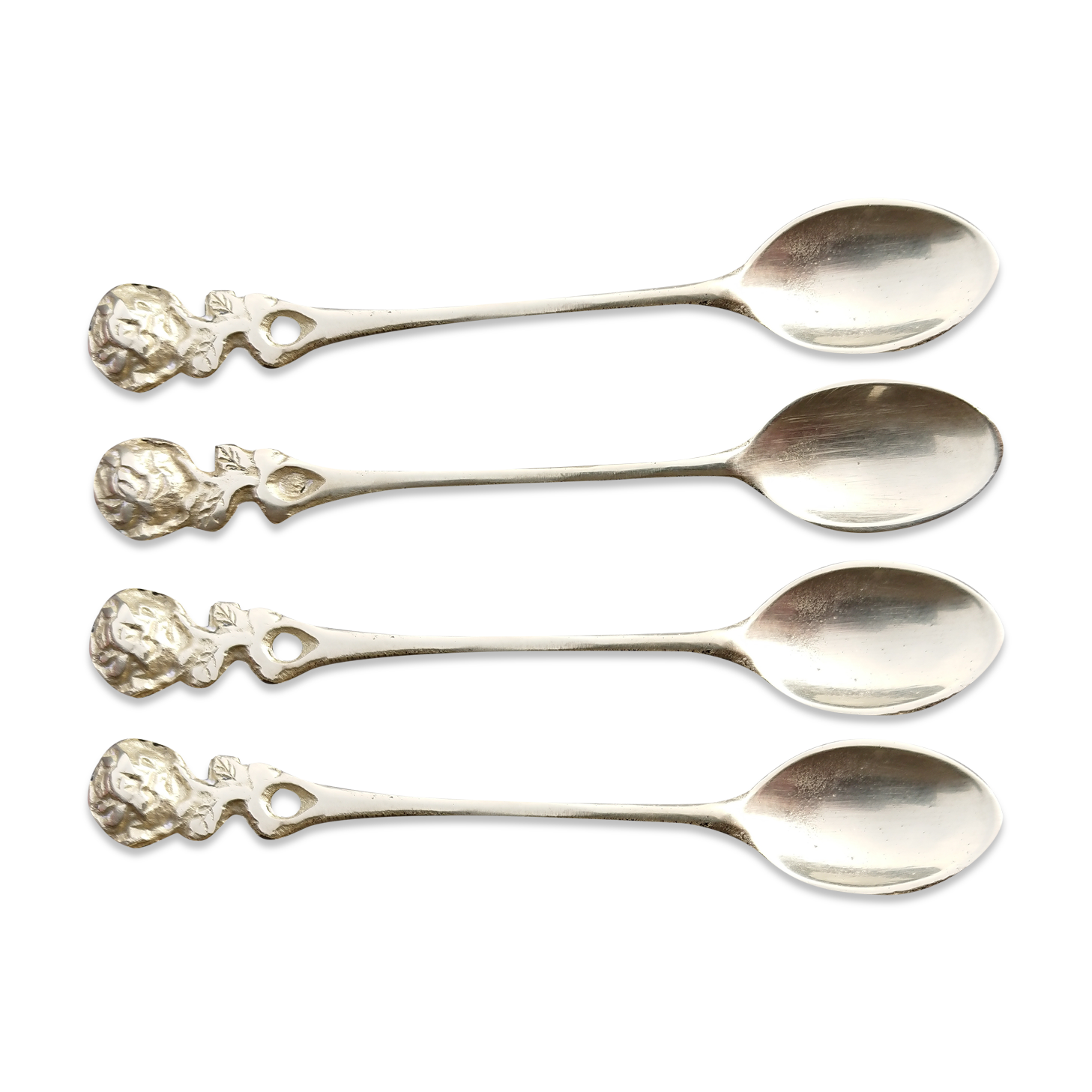 Small golden spoons with punch