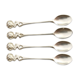 Small golden spoons with punch