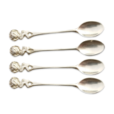 Small golden spoons with punch