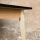 Vintage table in solid beech and black laminate tray
