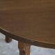 Mid-century modern round Danish side table in solid stained oak, 1960s.