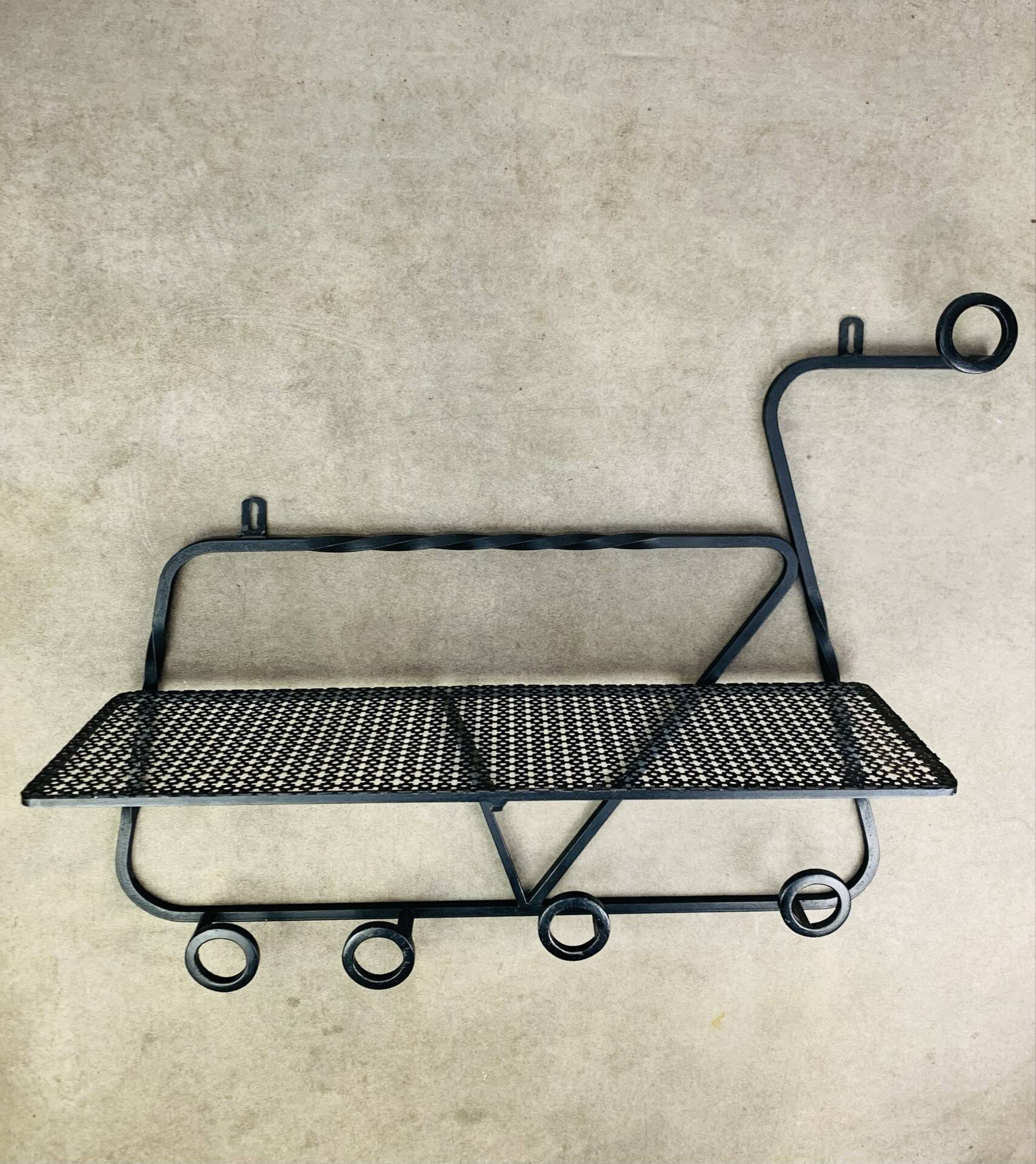 Wall-mounted coat rack/wardrobe from the 1950s, wrought iron and rigidule.