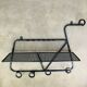 Wall-mounted coat rack/wardrobe from the 1950s, wrought iron and rigidule.