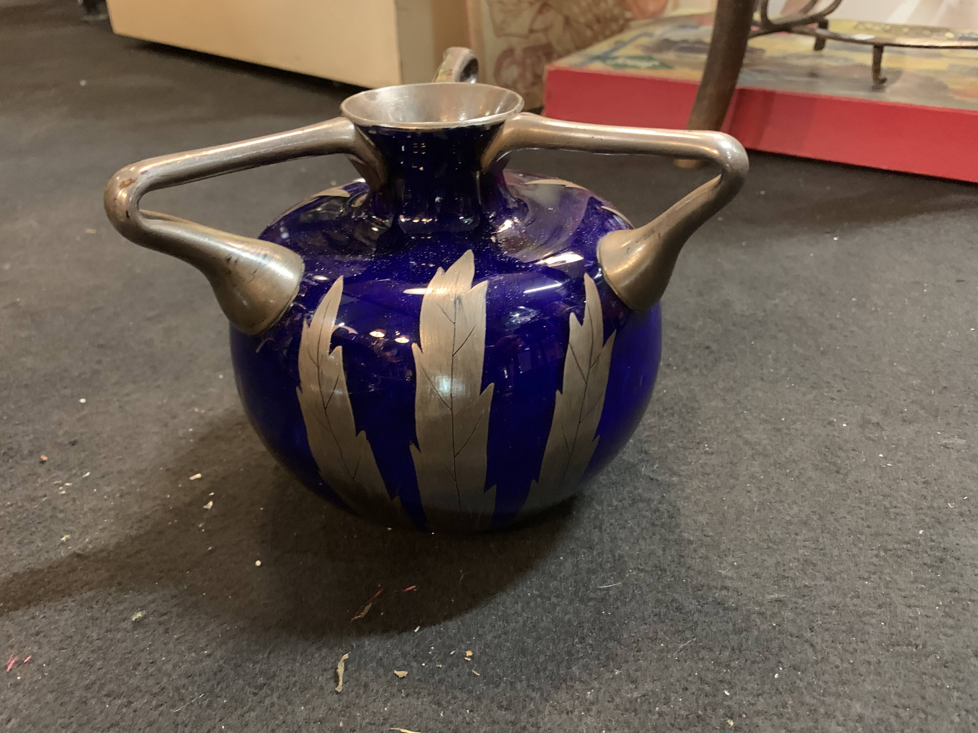 Blue vase and vintage silver