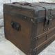 Old wooden and leather trunk, old brass nail trunk and leather strap