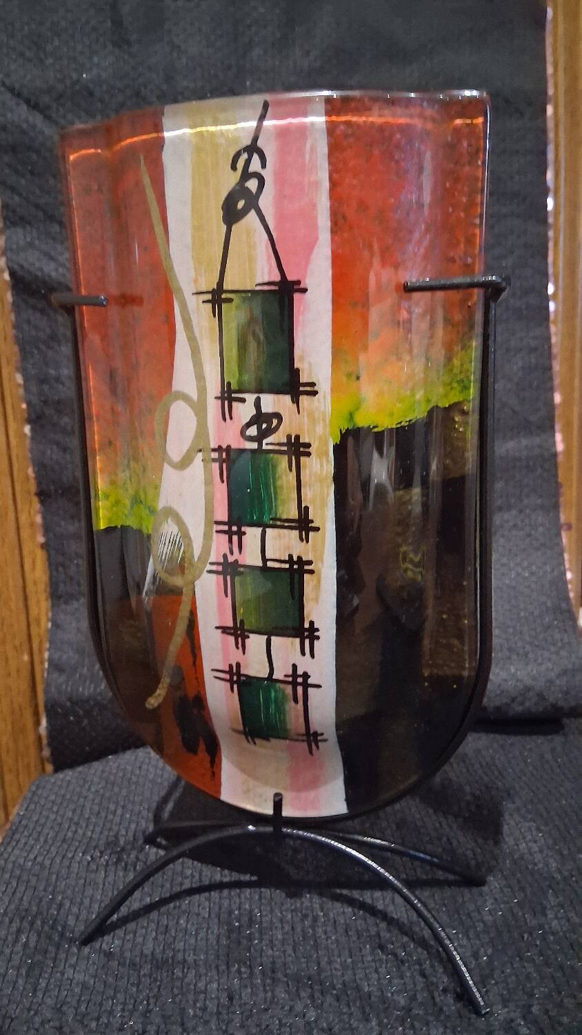 Multicoloured vase in the style of Dali.