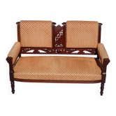 Old bench in wood and orange velvet