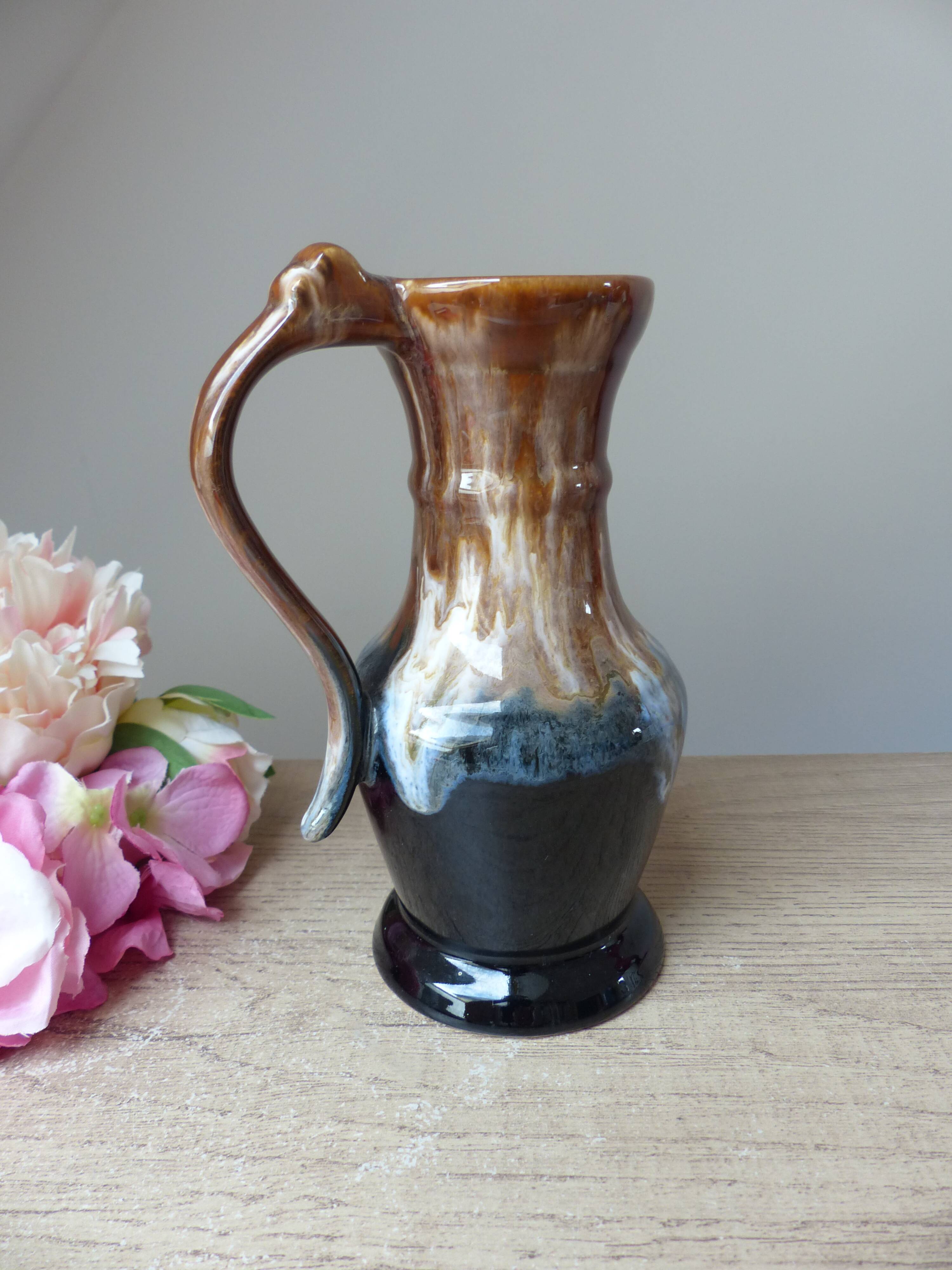 Old wine pitcher carafe in brown and blue flamed stoneware vintage 1960