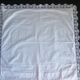 Old linen tablecloth with crocheted frills.