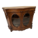 Curved mahogany display cabinet from the Napoleon III period. It has two doors and two shelves.