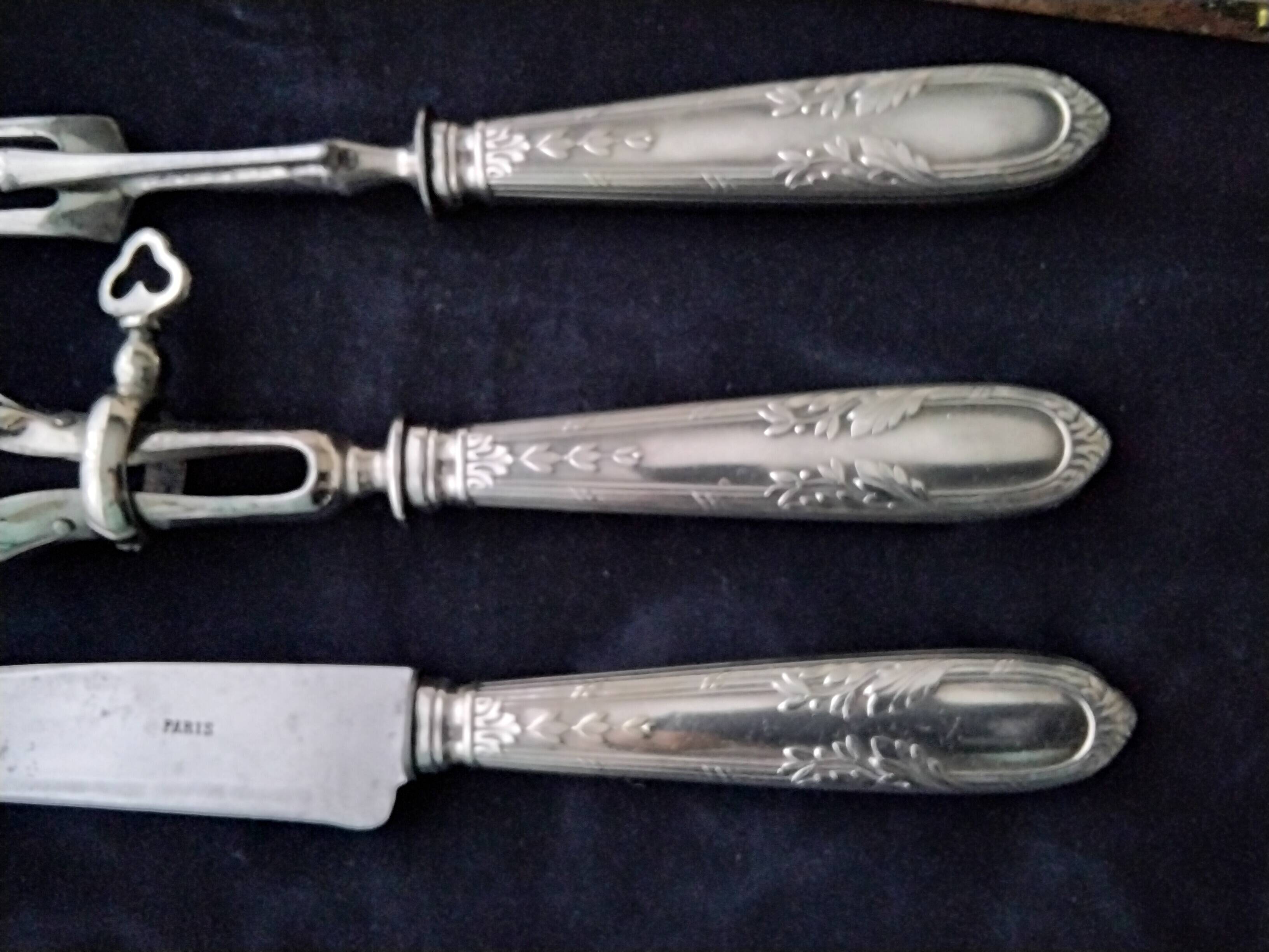 Old cutting service in steel and silver metal in its box