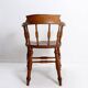 Elm armchair with curved back
