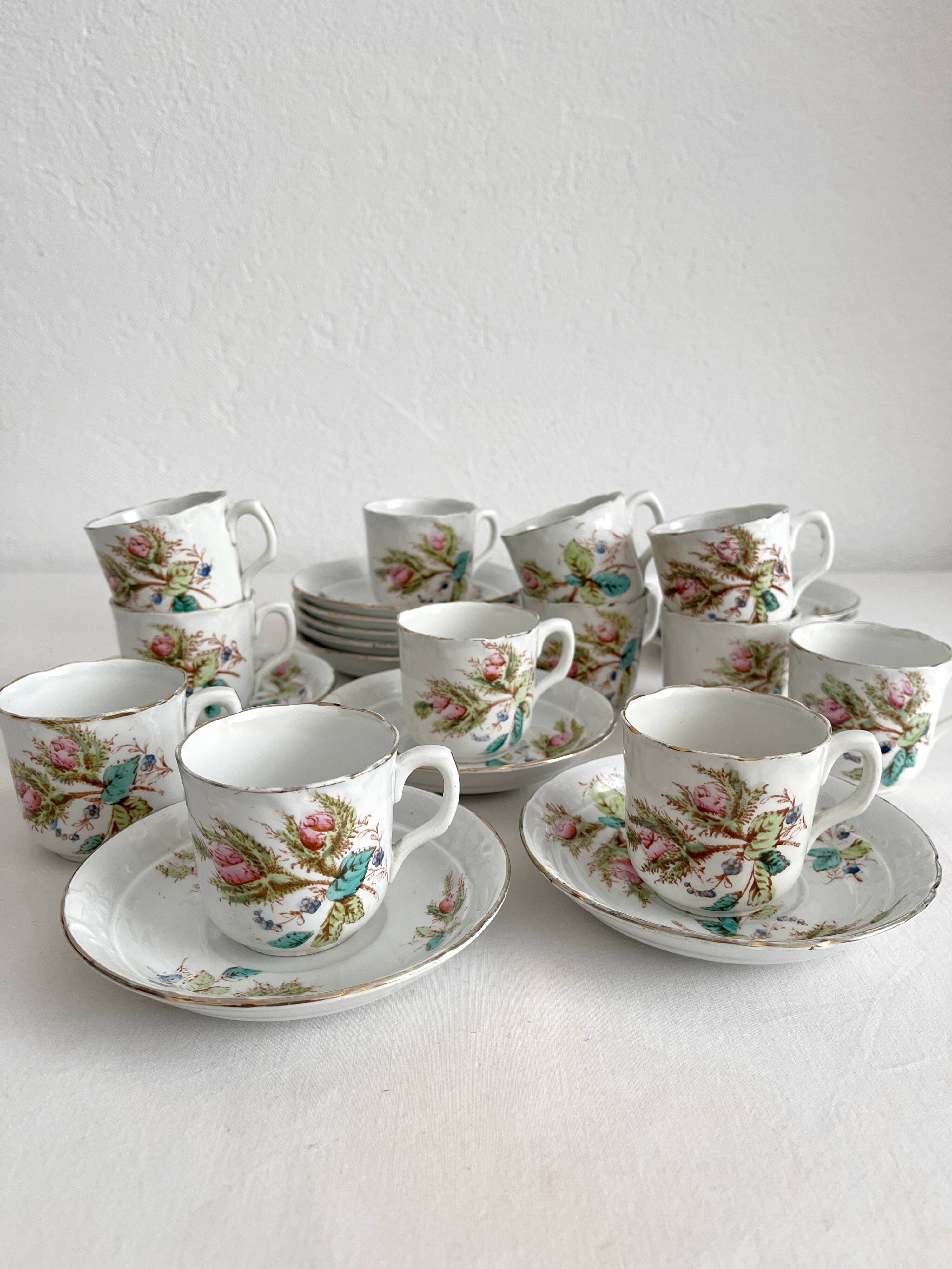 12 ironstone coffee cups with polychrome floral decoration, KG Lunéville