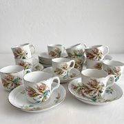 12 ironstone coffee cups with polychrome floral decoration, KG Lunéville