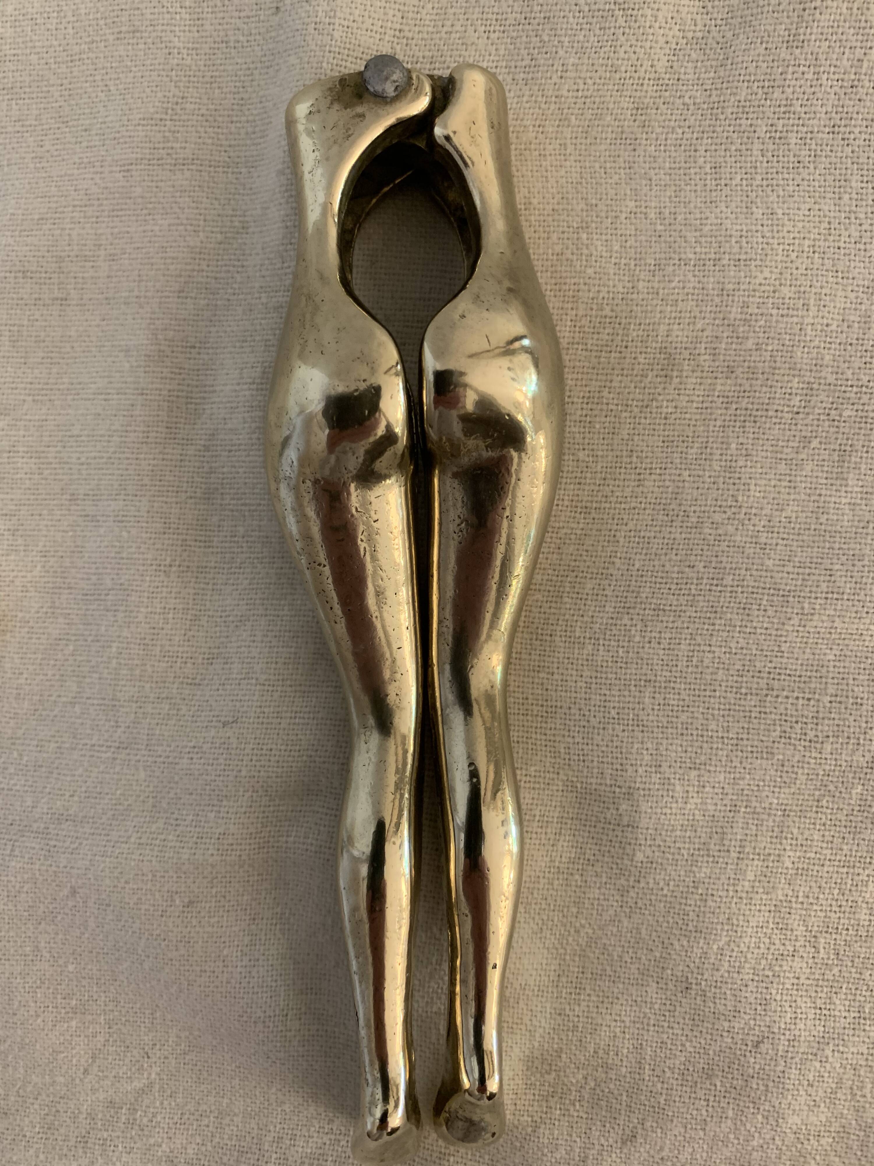 Pair of nutcrackers or anthropomorphic hazelnuts in bronze