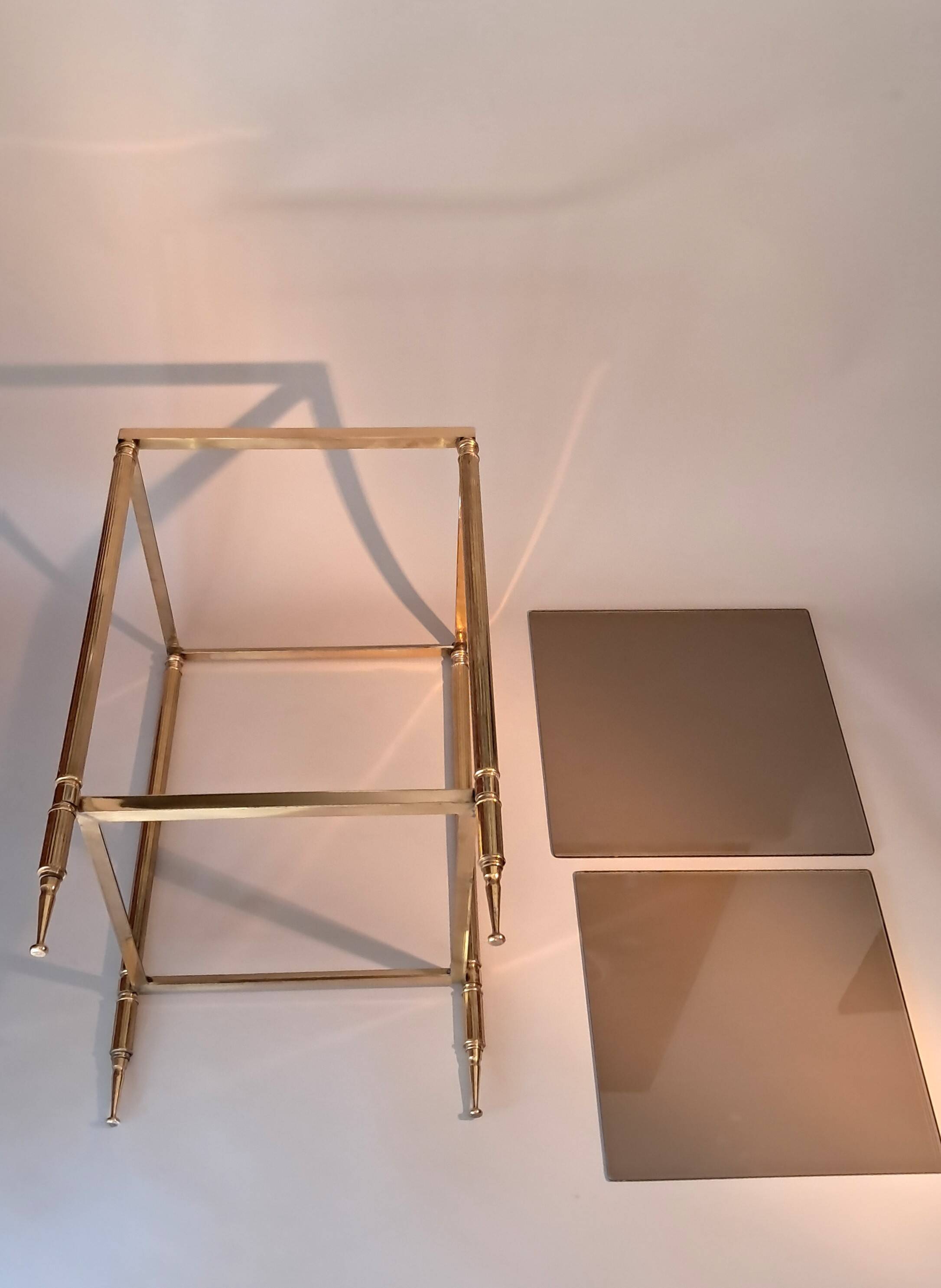 Gilded brass and smoked glass end table, 1960s.