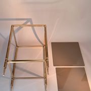 Gilded brass and smoked glass end table, 1960s.