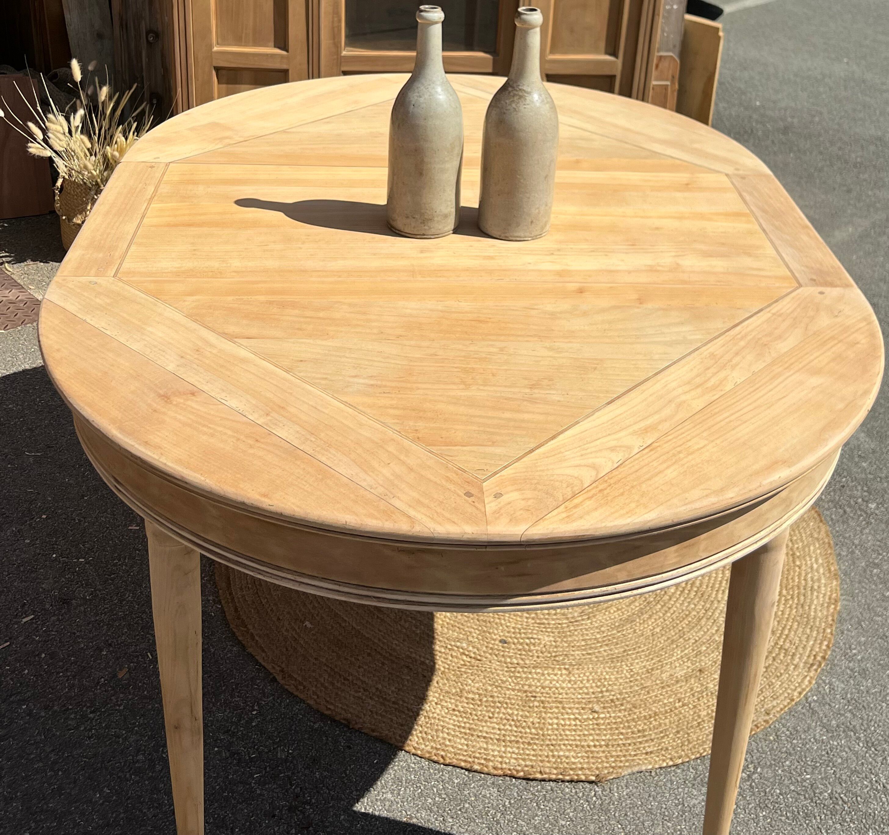 Round table + 1 renovated old extension in raw solid wood