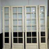 Double glass door in the living room of a Haussmannian apartment
