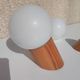 Pair of vintage wall lights in varnished pine and opal glass, 1970s-80s.
