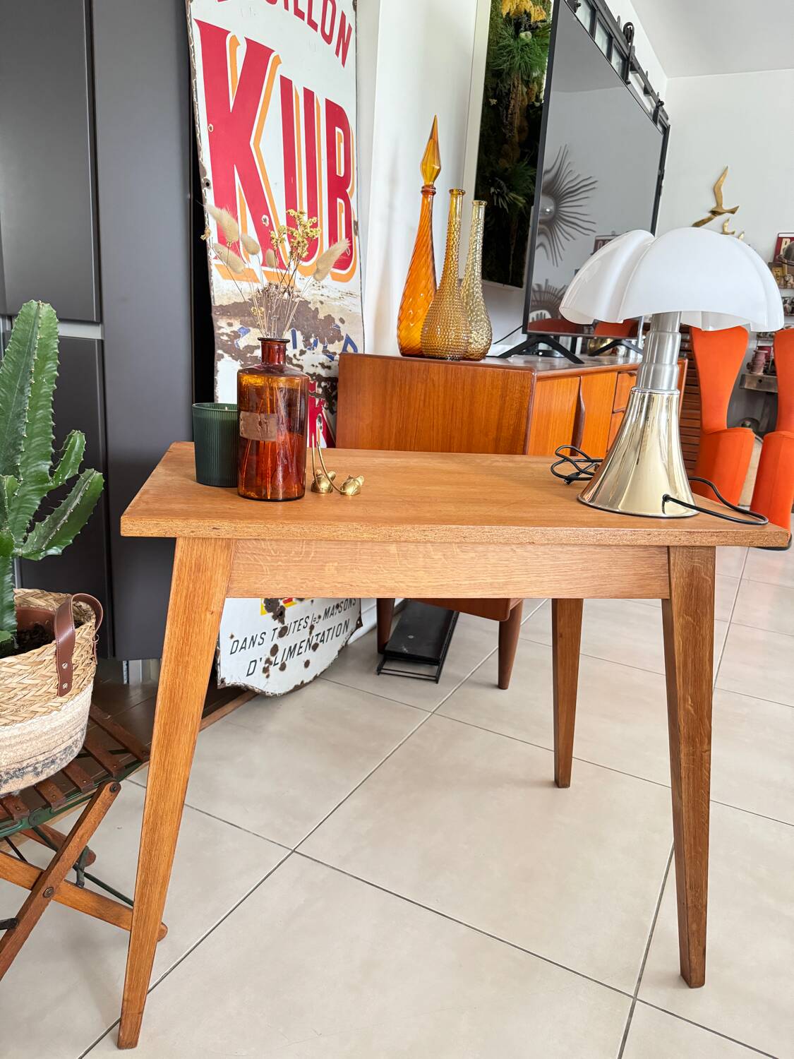 Old wooden desk or side table with compass legs