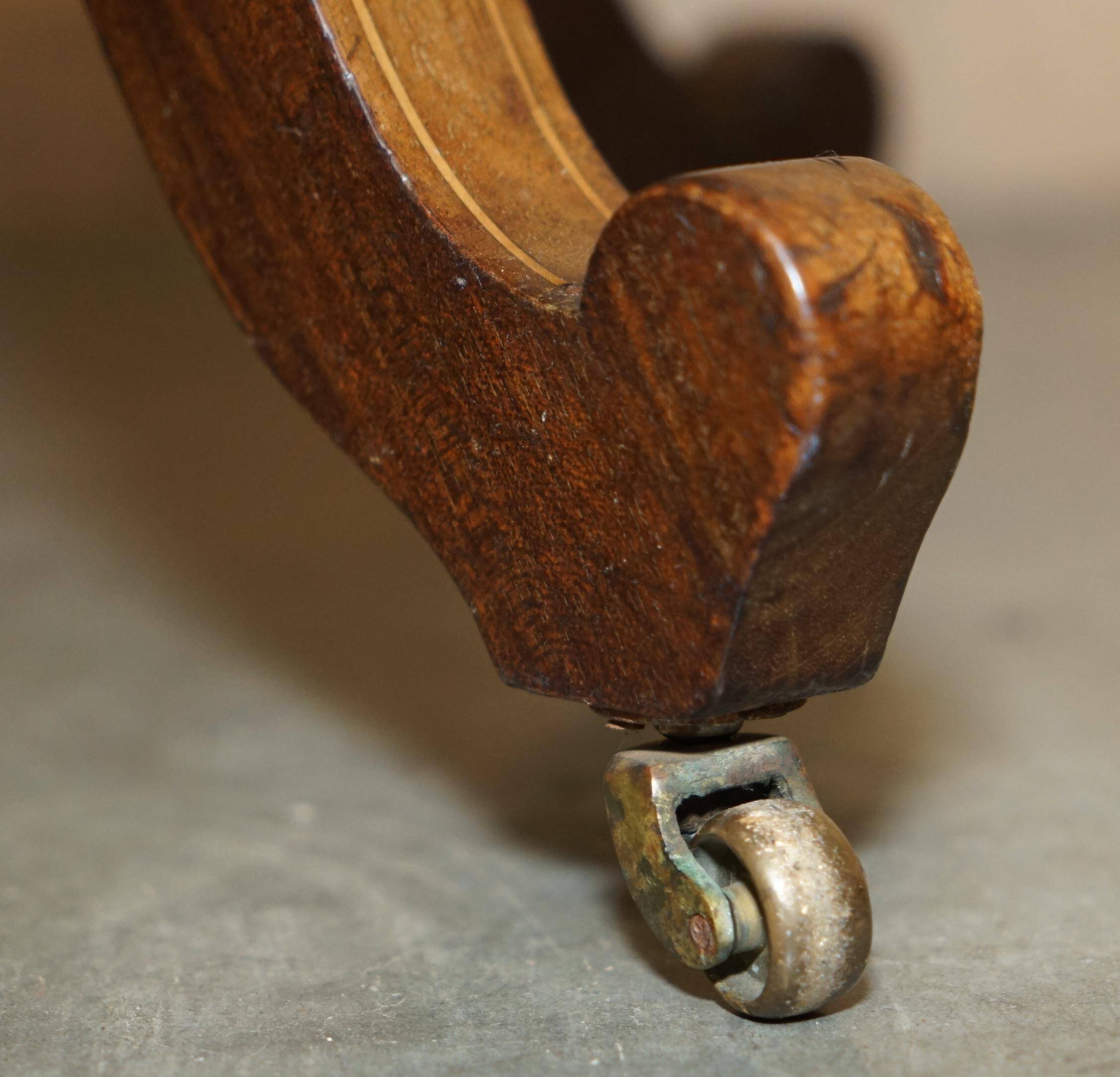Victorian captain's chair in leather restored by Cornelius V Smith.