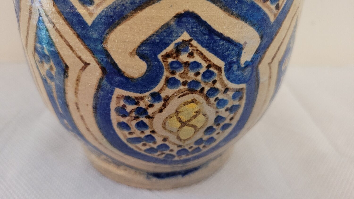 Pot in painted earth
