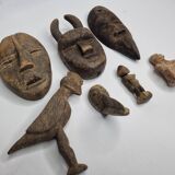 Collection of passport masks and sculptures in wood and terracotta, 7 pieces, 5 to 18 cm
