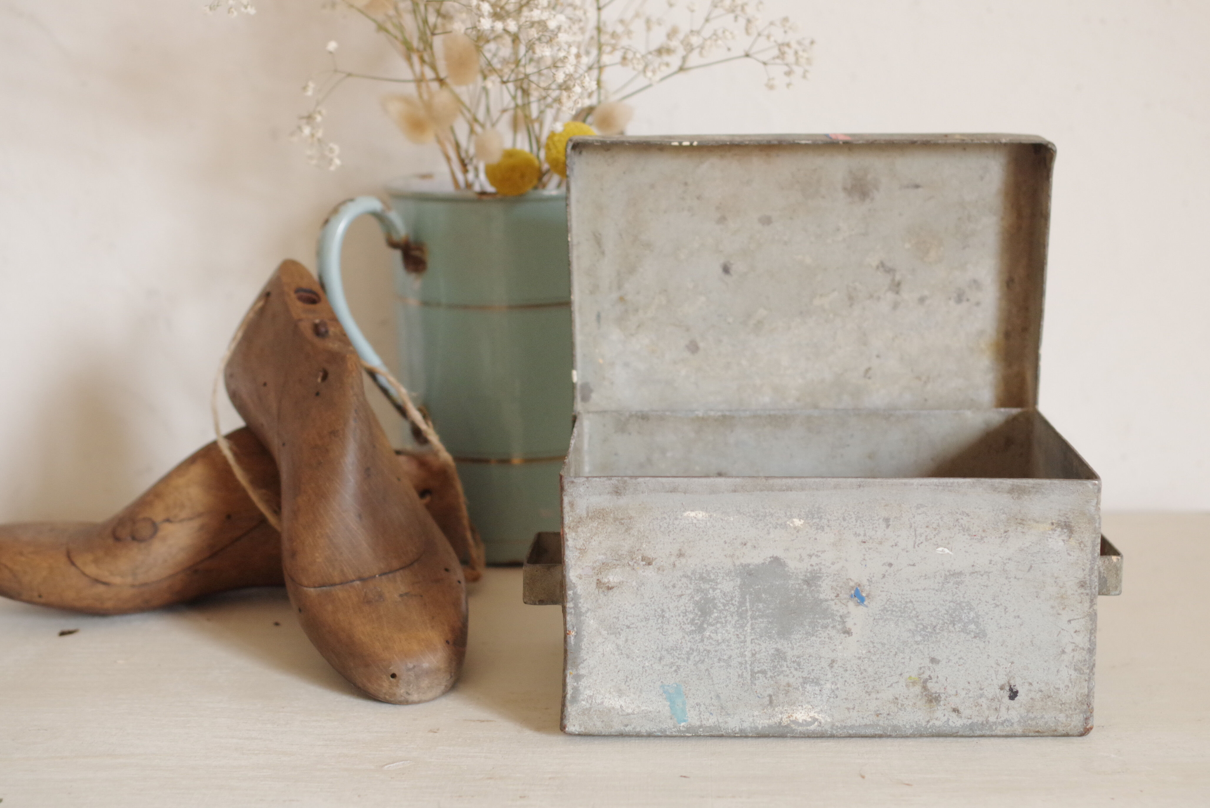 Small old white metal box