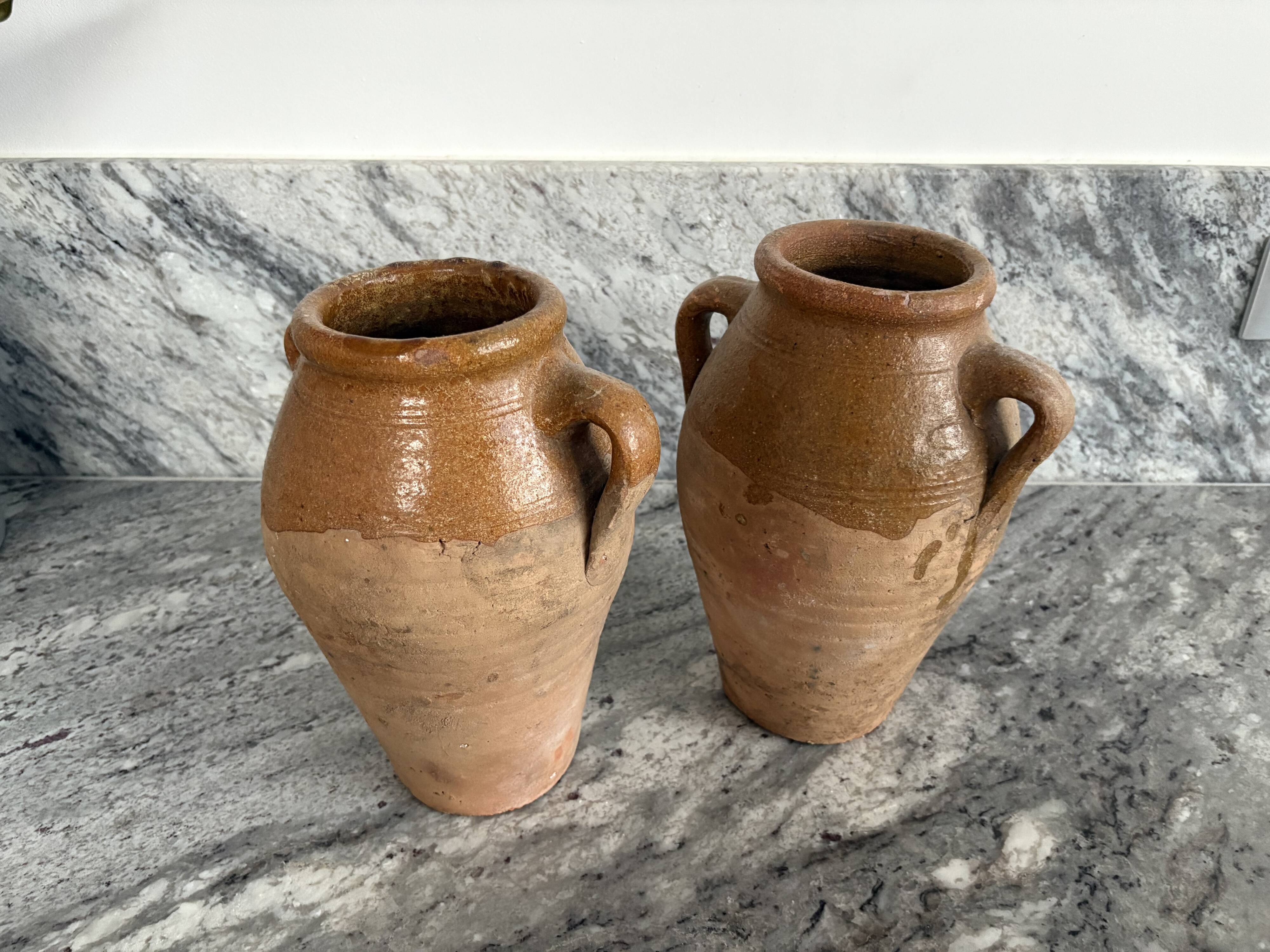 Pair of Provençal enamelled terracotta jars