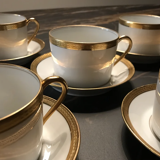 5 Haviland tea cups and sub-cups