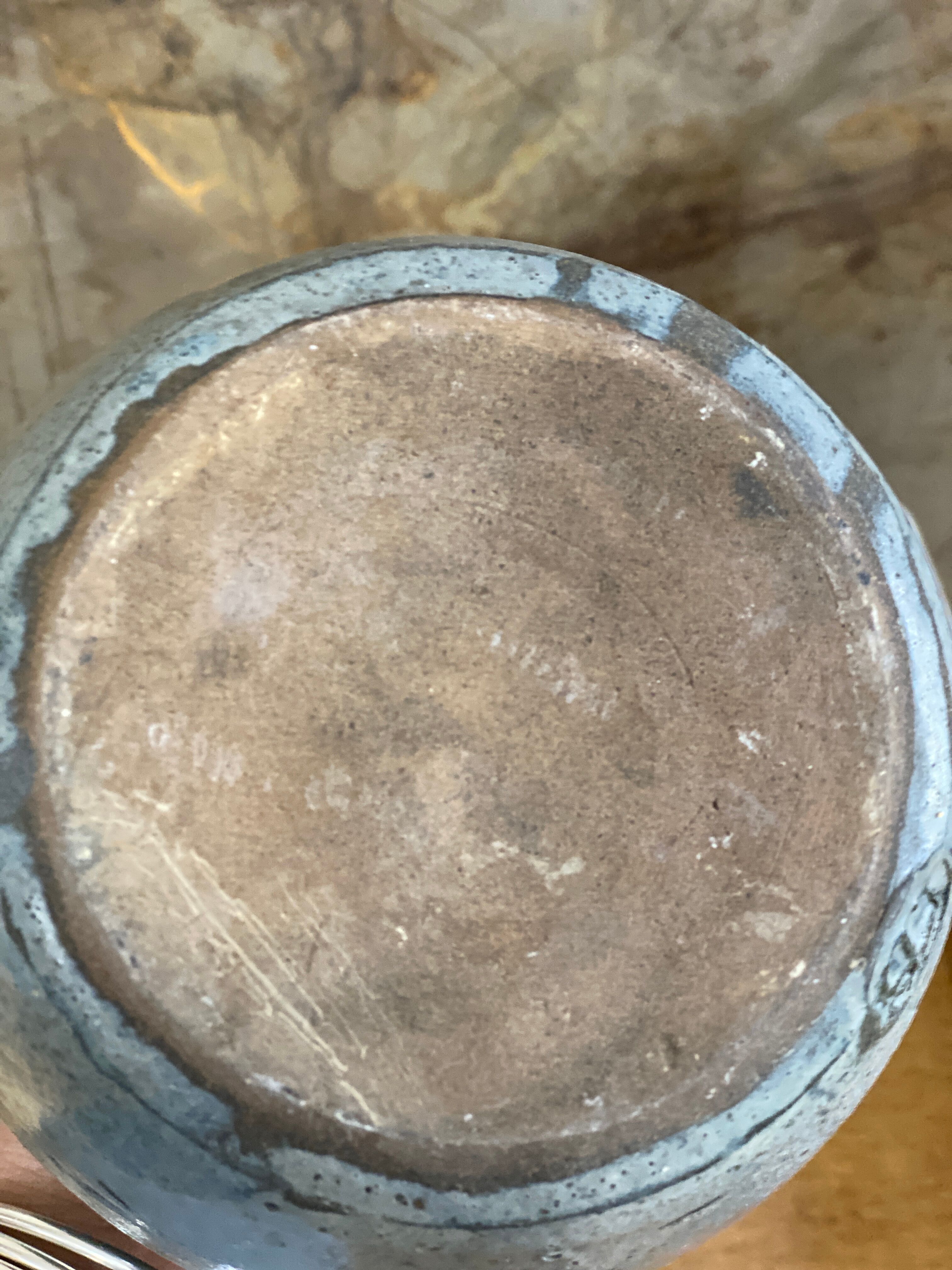 Old bluish grey ceramic vase