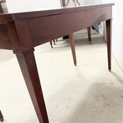 Louis XVI style desk in mahogany and veneer, 20th century.