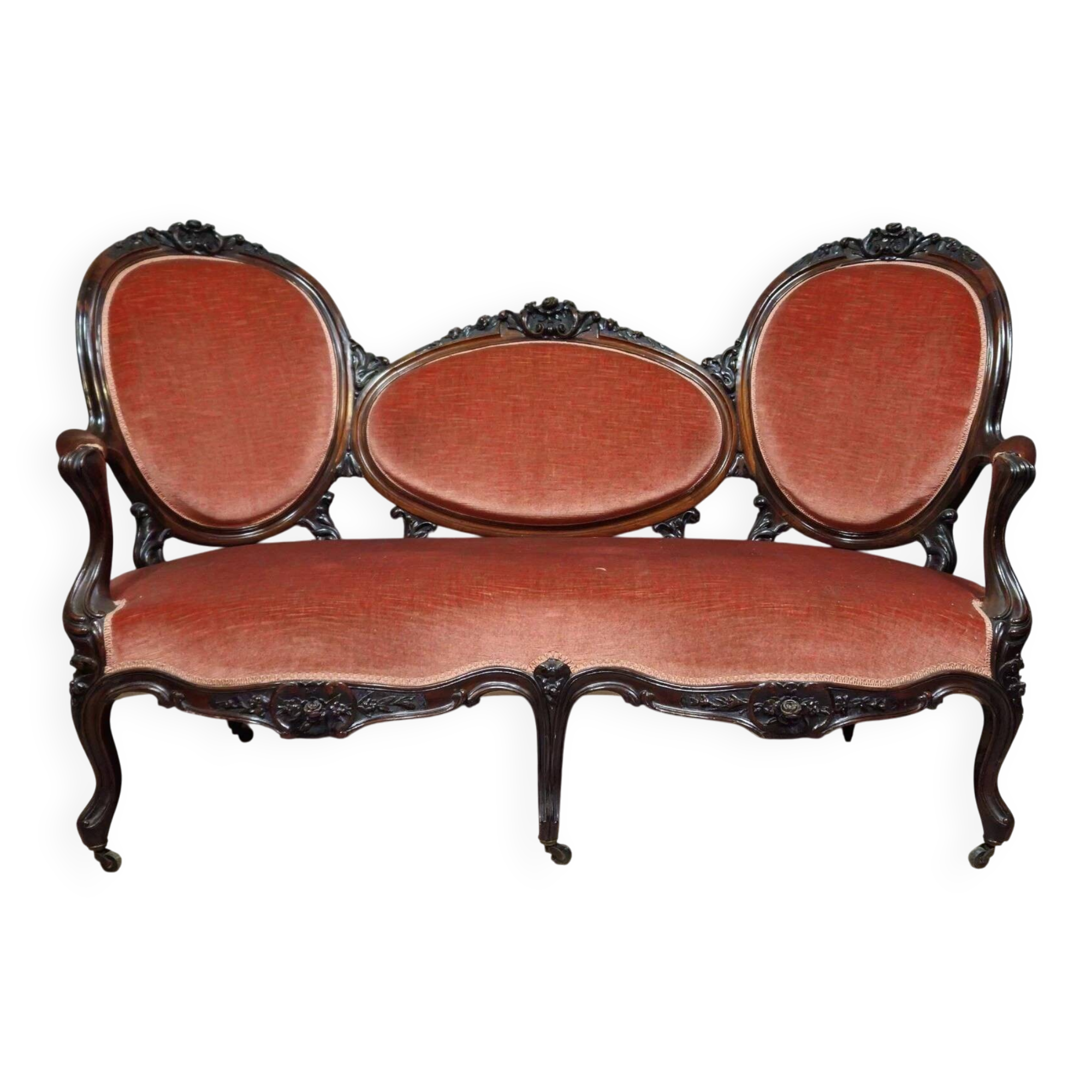Very large Louis XV style mahogany banquette with medallions from the 19th century.