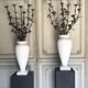 Pair of carrara marble vases, bronze bouquet of flowers