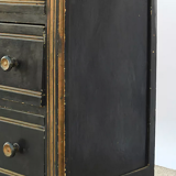 Chest of drawers in black lacquered wood