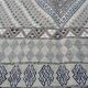 Traditional handmade Berber carpet in brown and beige wool.