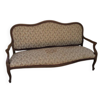 Banquette de style en bois mouluré et tapisserie fleurie – Charme d'antan
