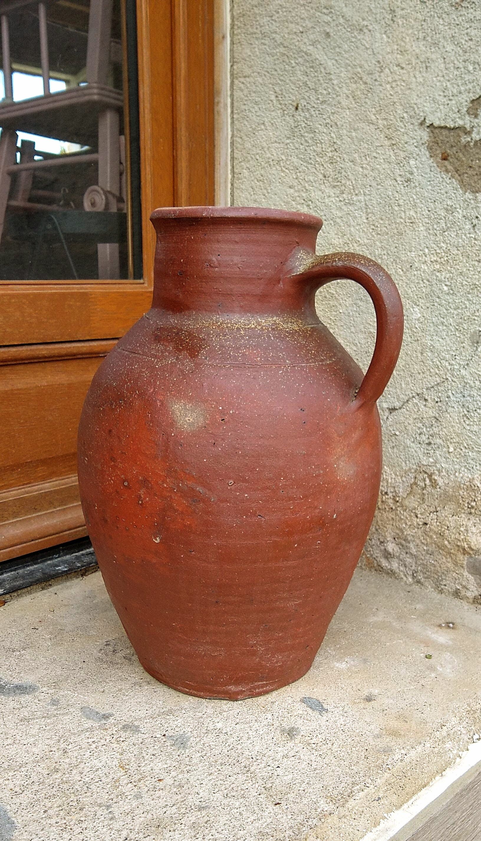 High terracotta jug