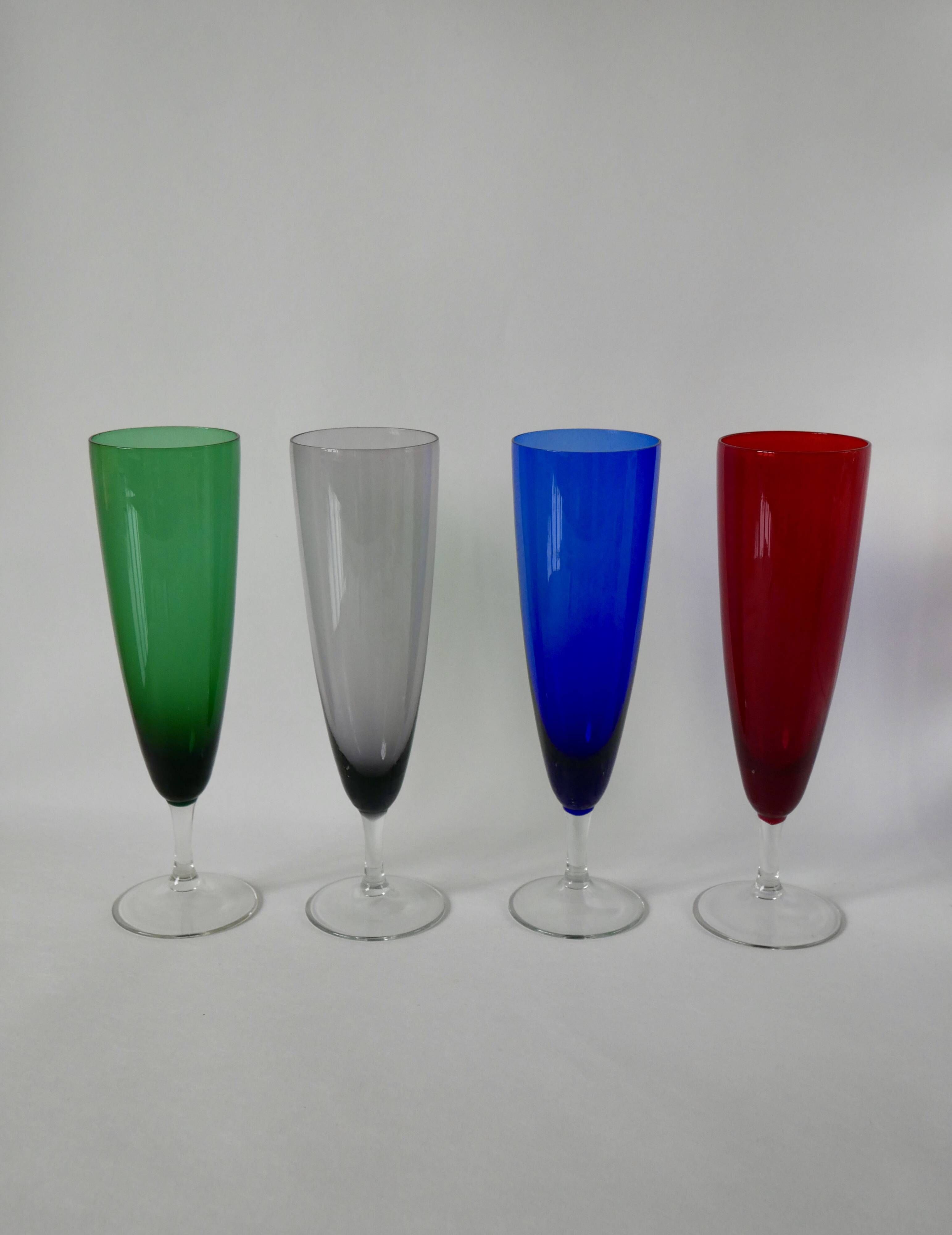 Set of 4 designer champagne flutes in colored glass from the 70s