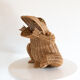 Wicker and braided rattan magazine door by Olivier Cajan