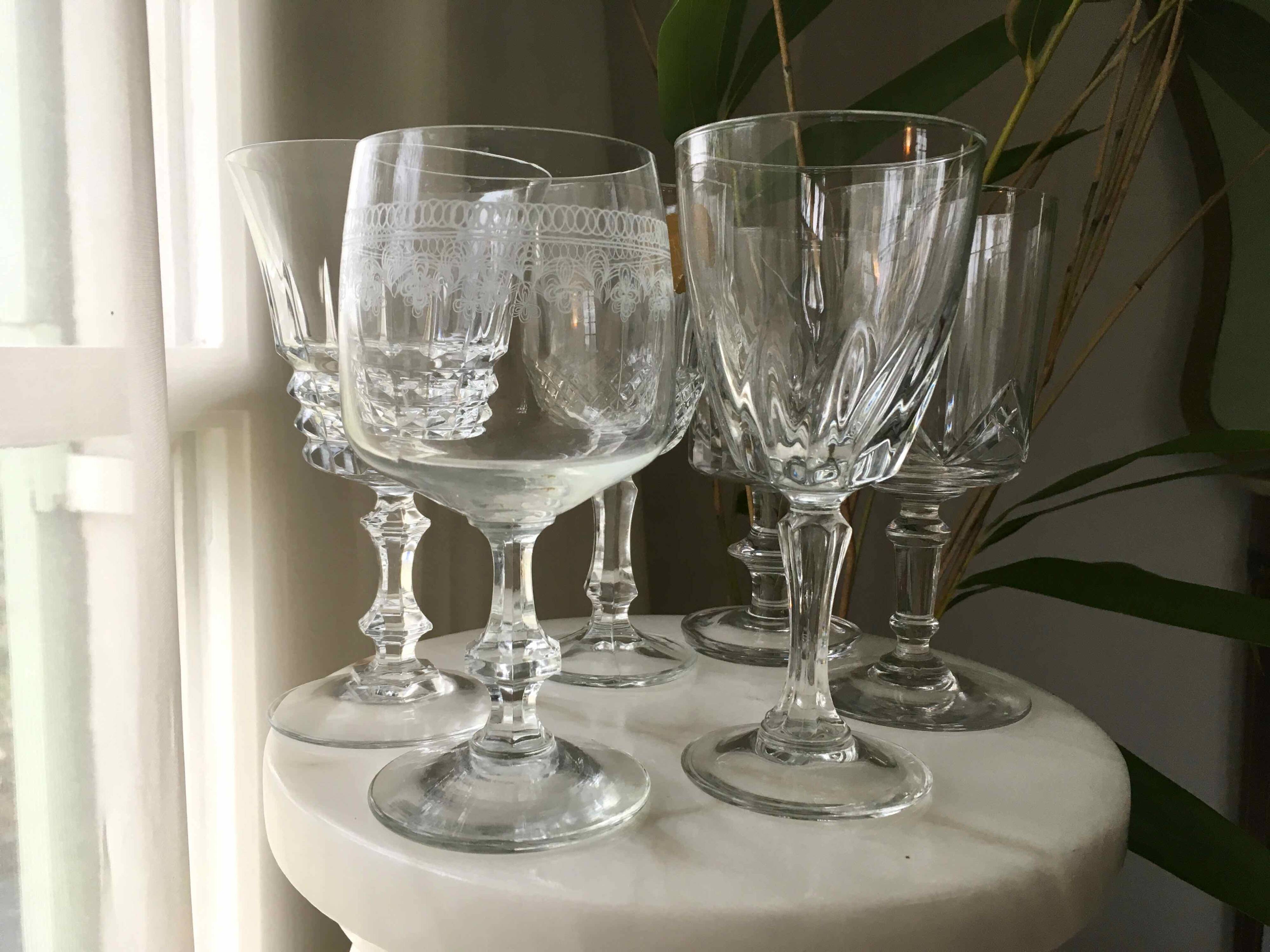 6 assorted crystal wine glasses
