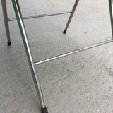 Metal folding chair and rope