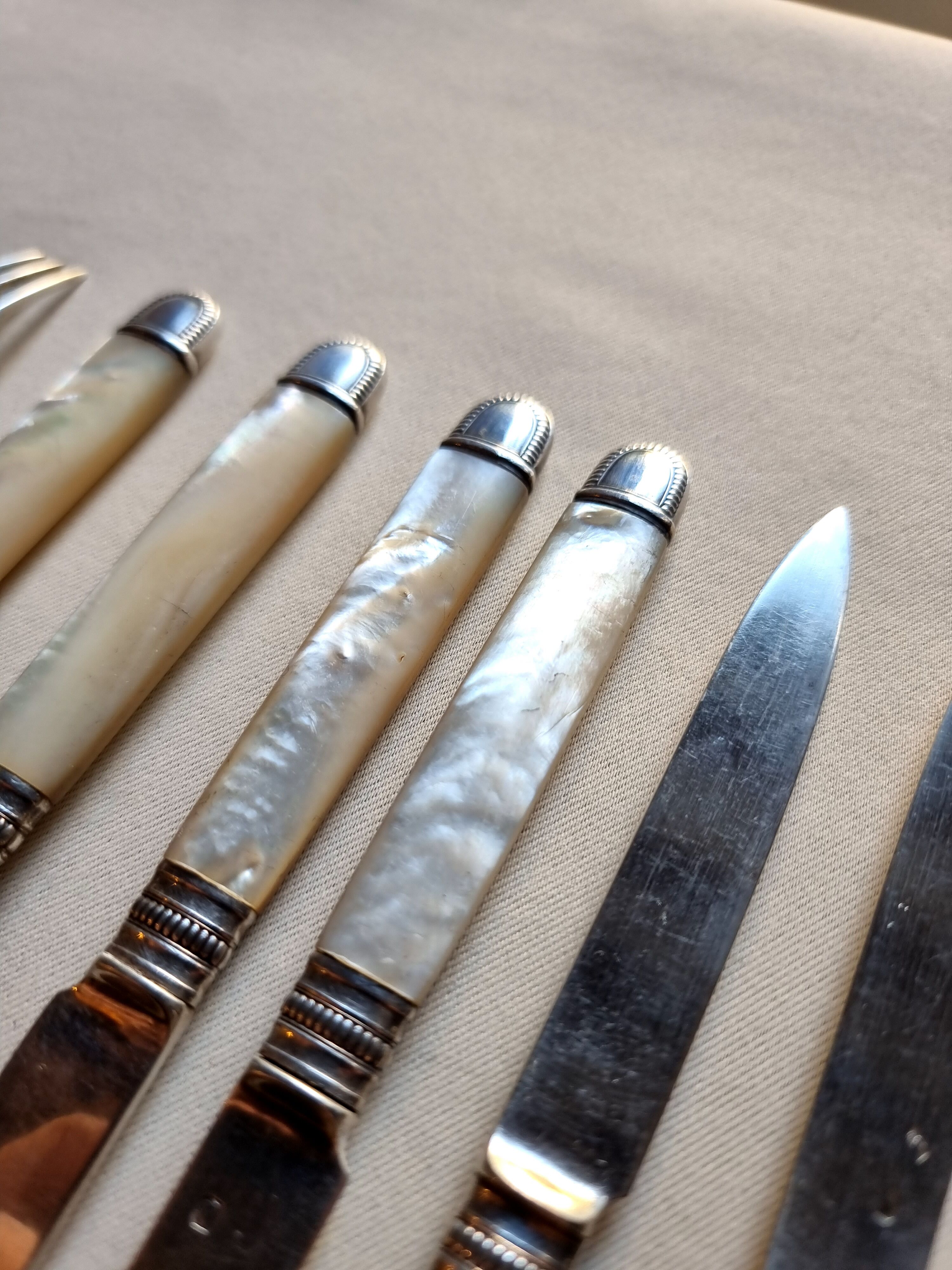 Knives and forks, XIXth, silver blades and forks, mother-of-pearl handle, minerva hallmark