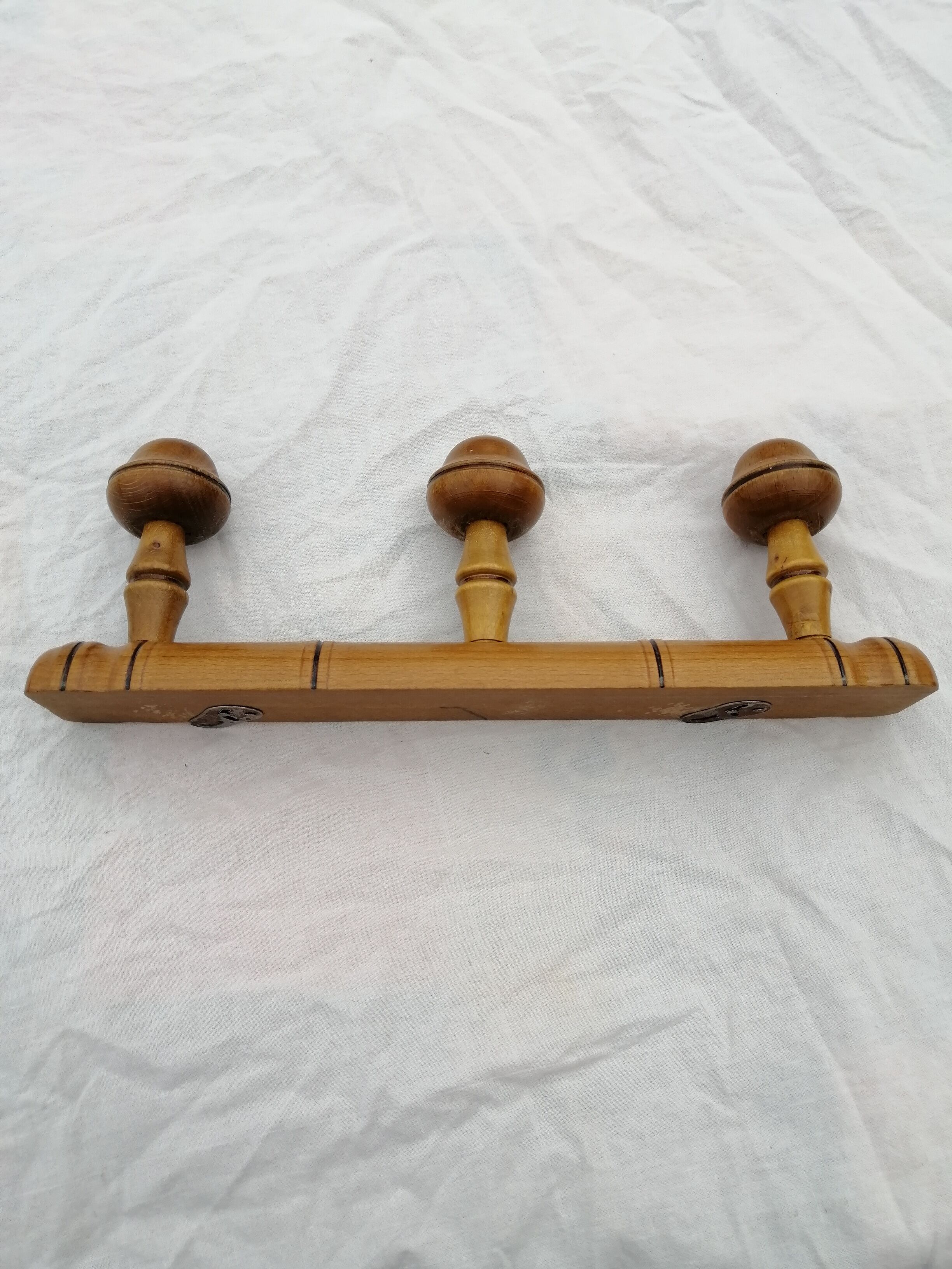Wooden wall coat rack