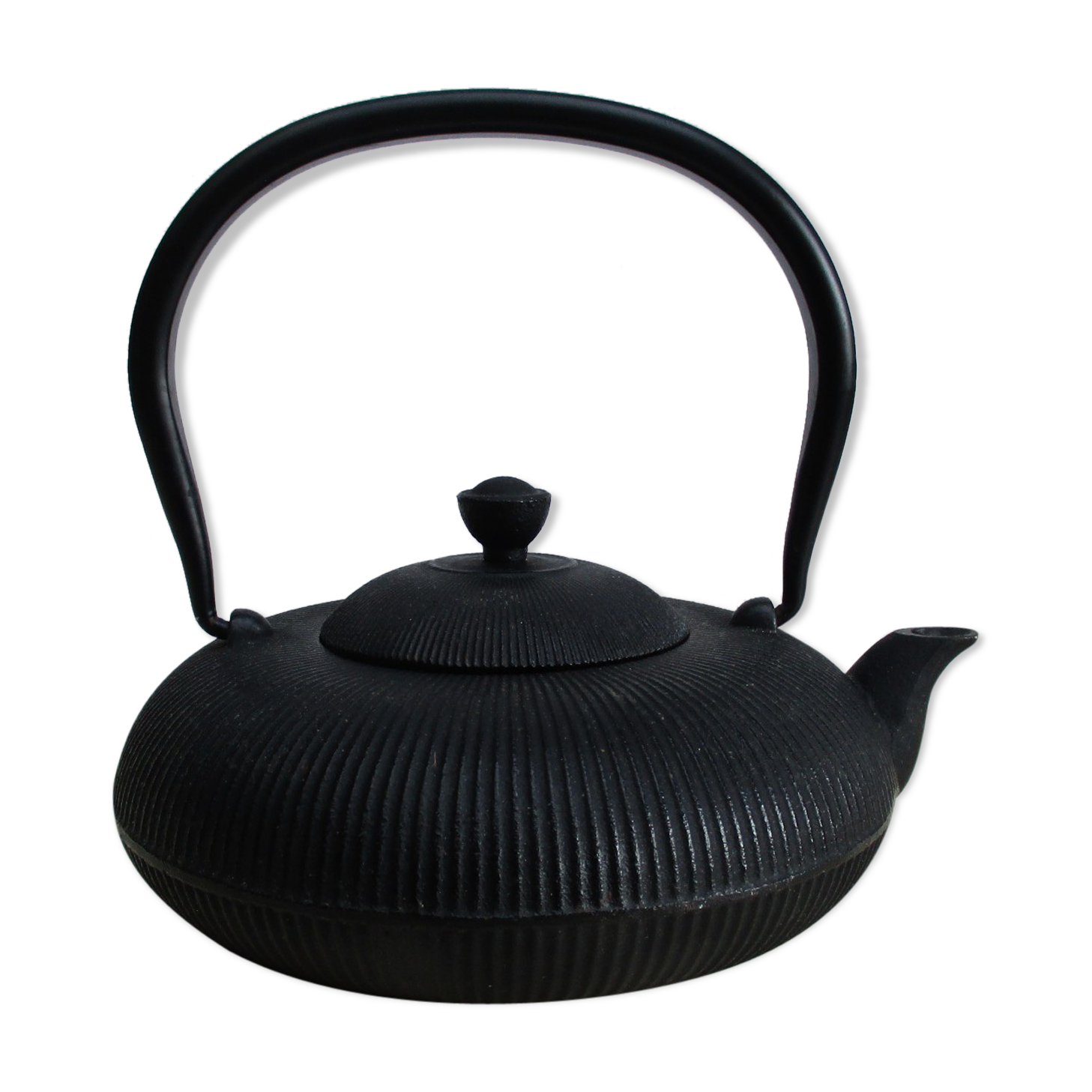 Asian teapot in black cast iron